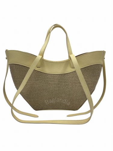 Torebka damska Vera Pelle wykonana z naturalnej skóry w modnym jasnożółtym kolorze. Shopper o plecionym, słomkowym wykończeniu idealny na lato, do miasta i na wakacje. Pojemna do noszenia na ramieniu lub w ręku. W zestawie praktyczna saszetka na zamek.