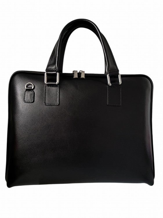 Elegancka damska torba na laptopa A4 wykonana z naturalnej skóry licowej. Włoska marka Vera Pelle. Idealna do pracy i na spotkania biznesowe. Klasyczna czarna torba skórzana z regulowanym paskiem.